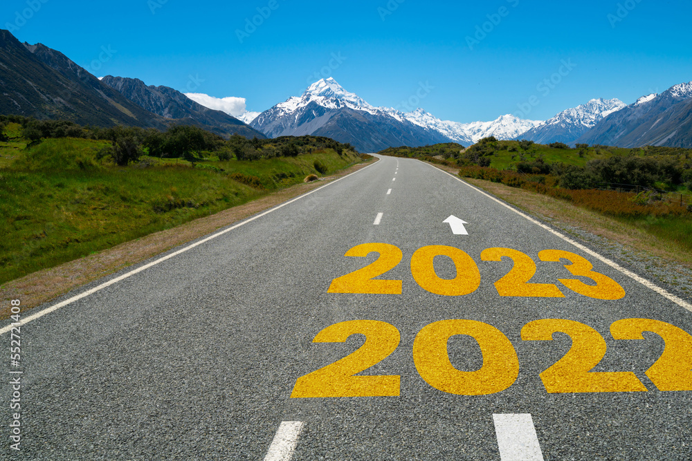 2023 New Year road trip travel and future vision concept . Nature landscape with highway road leadin