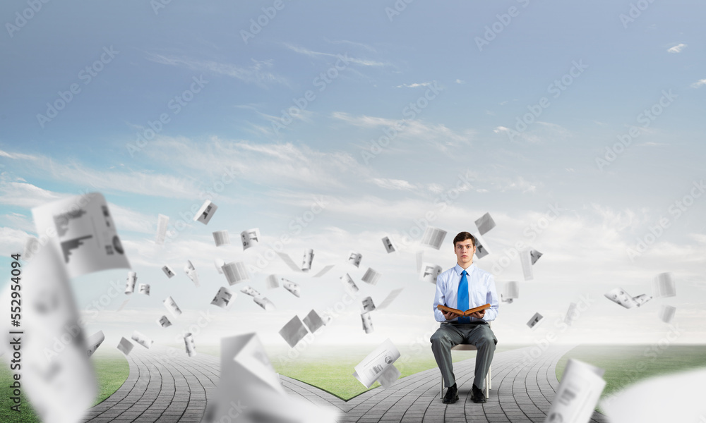 young businessman with book