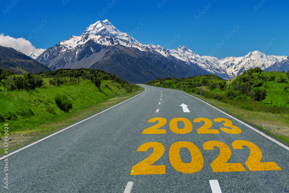 2023 New Year road trip travel and future vision concept . Nature landscape with highway road leadin