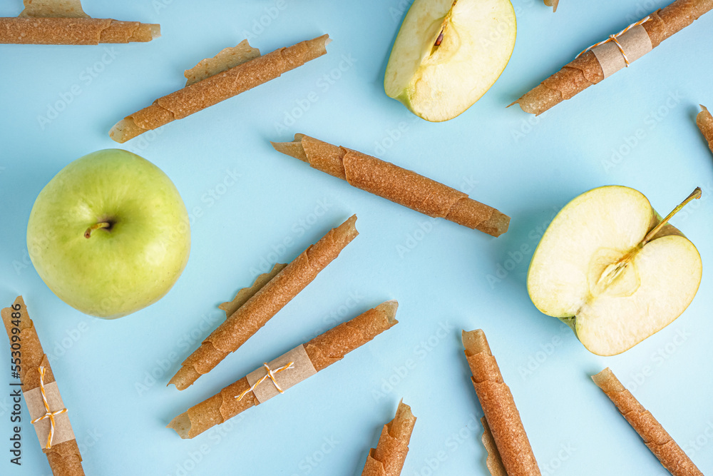 Tasty apple pastilles on color background