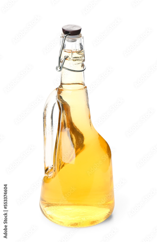 Bottle of fresh apple cider vinegar on white background