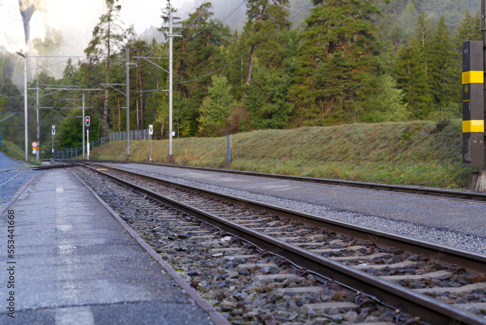 Railway station Versam-Safien, Canton Graubünden, on a blue cloudy autumn morning. Photo taken Septe