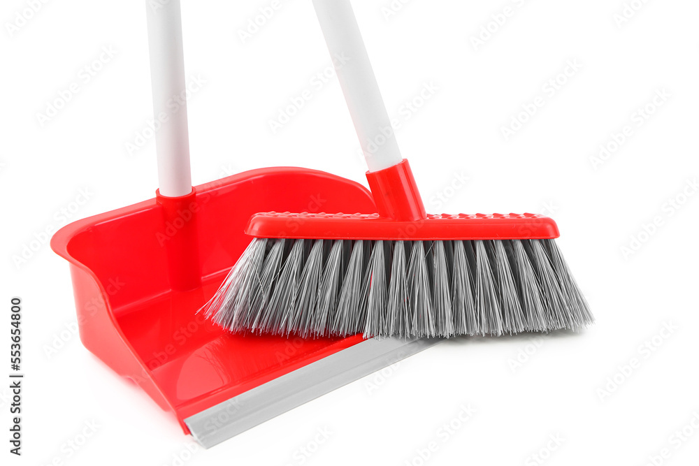 Dustpan with broom isolated on white background, closeup