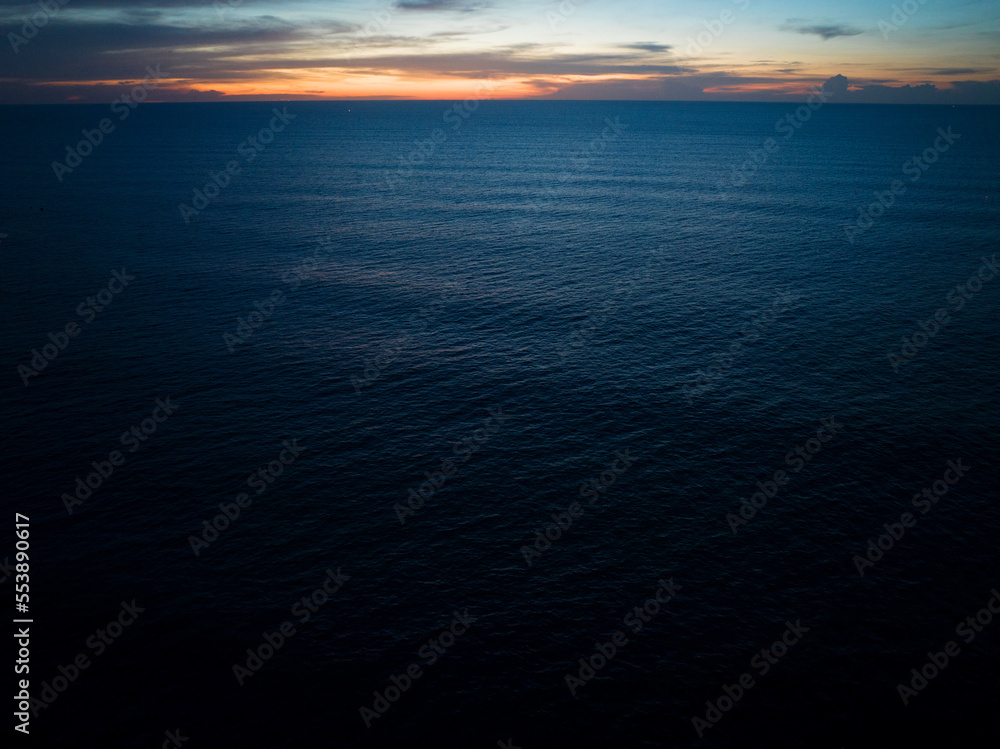 Aerial view Nature beautiful Light Sunset or sunrise over sea surface, Colorful Dramatic majestic sc