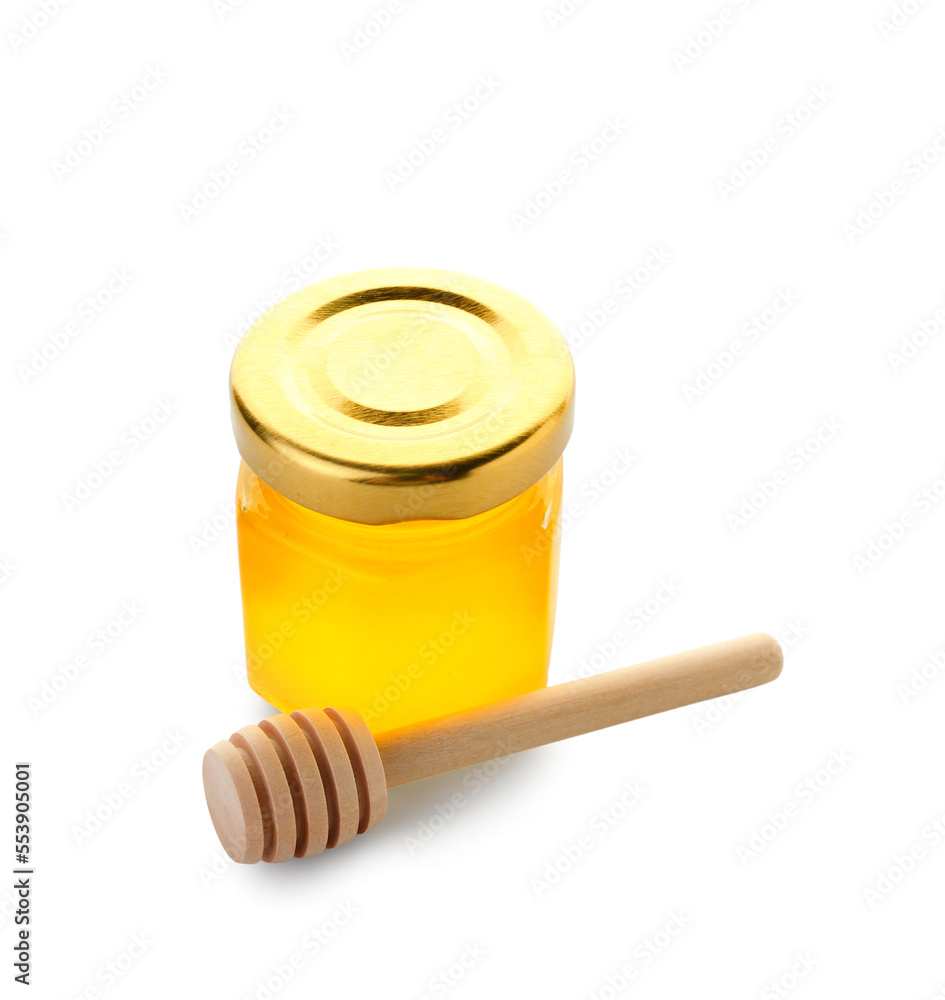 Jar with honey and dipper on white background