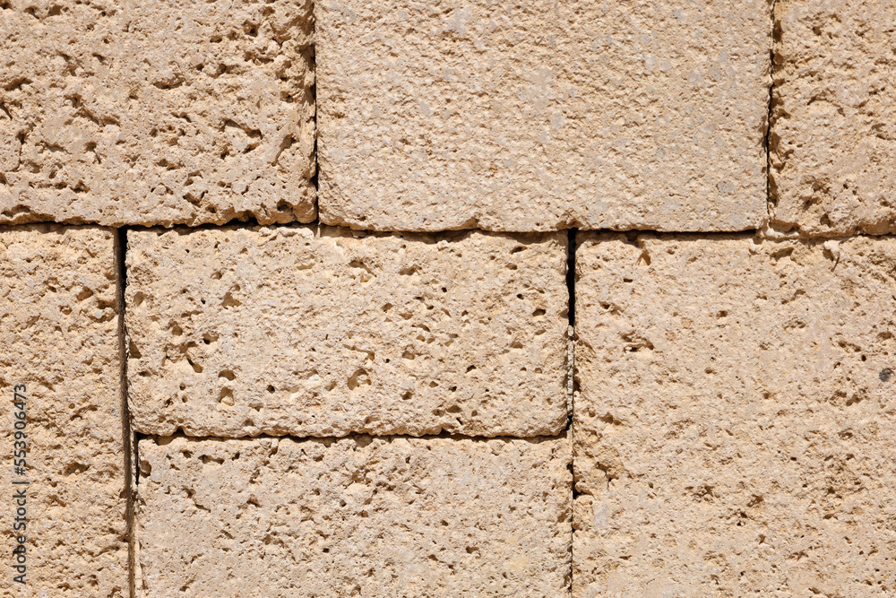 Stone bricks as background, closeup