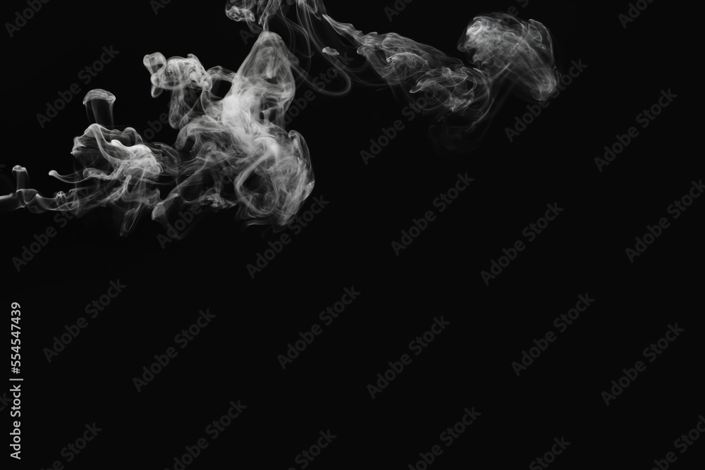 White smoke on black background, closeup