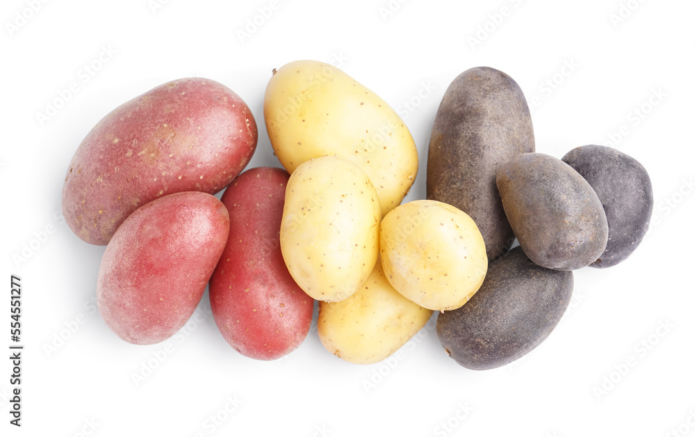 Heap of different raw potatoes isolated on white background