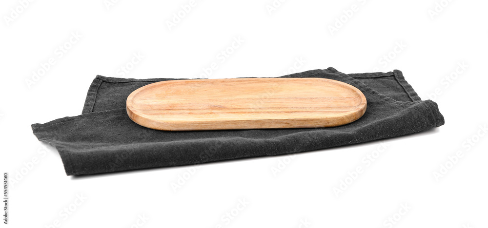 Wooden board with black napkin on white background