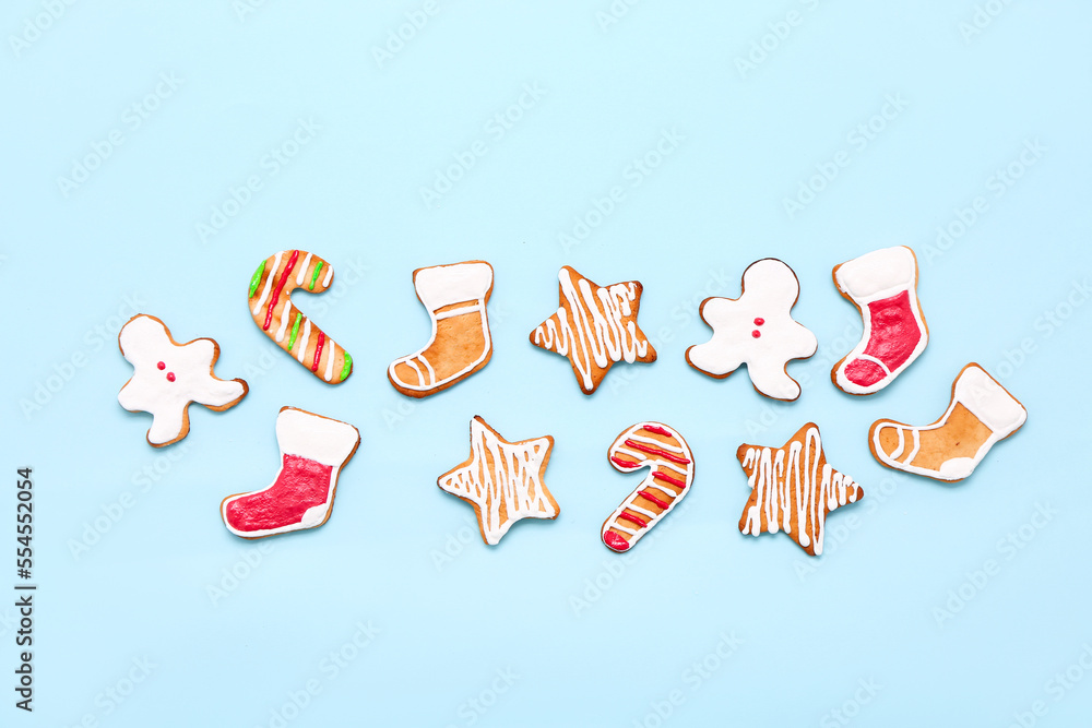 Set of different Christmas cookies on color background