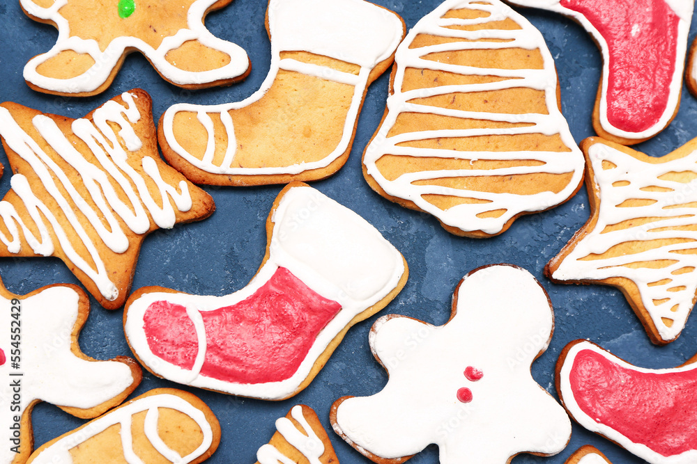 Composition with sweet Christmas cookies on color background, closeup