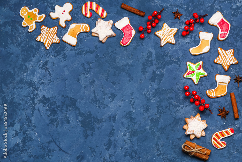 Composition with tasty Christmas cookies and decor on color background