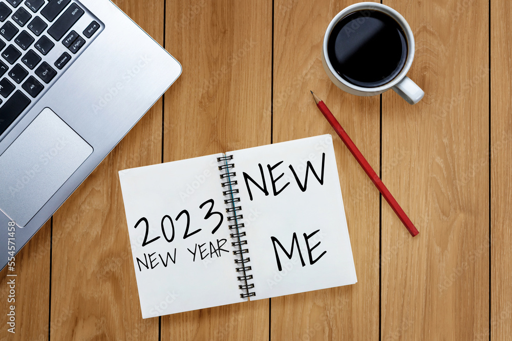 2023 Happy New Year Resolution Goal List and Plans Setting - Business office desk with notebook writ