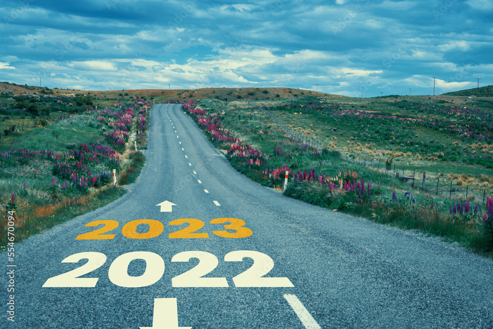 2023 New Year road trip travel and future vision concept . Nature landscape with highway road leadin