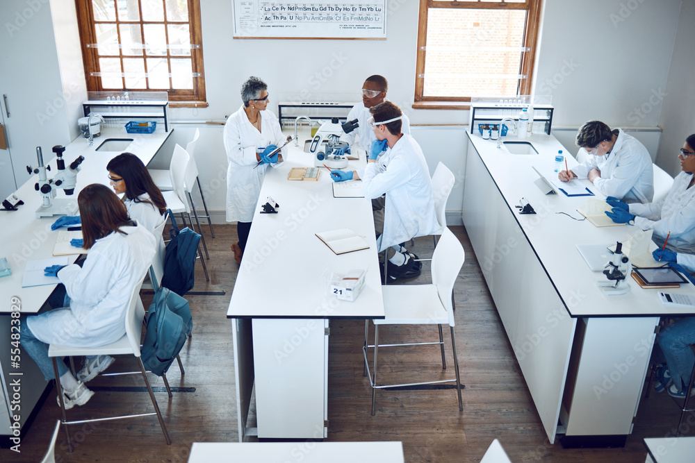 Education, science and students in lab classroom with professor and equipment for test. Technology, 