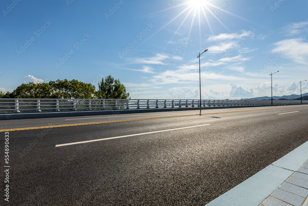 Asphalt road with sky cloud background