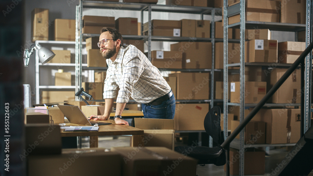 Stylish Small Business Owner Preparing a Small Parcel for Postage. Inventory Manager Thinking About 