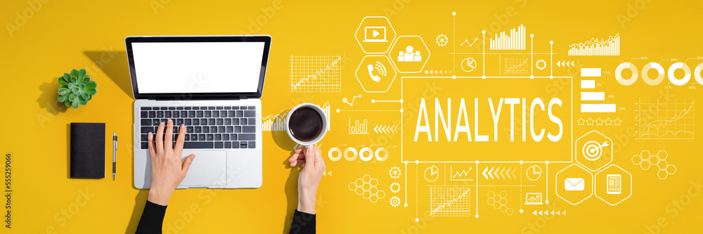 Analytics theme with person using a laptop computer