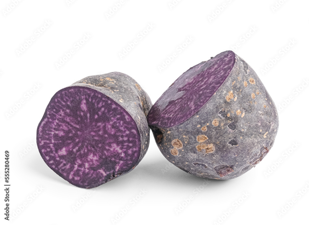 Cut raw purple potato on white background