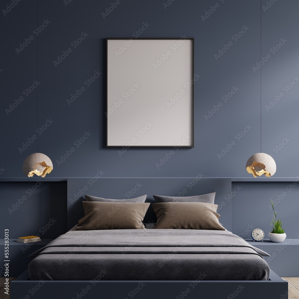 Poster mockup with vertical frame on empty dark blue wall in bedroom interior.