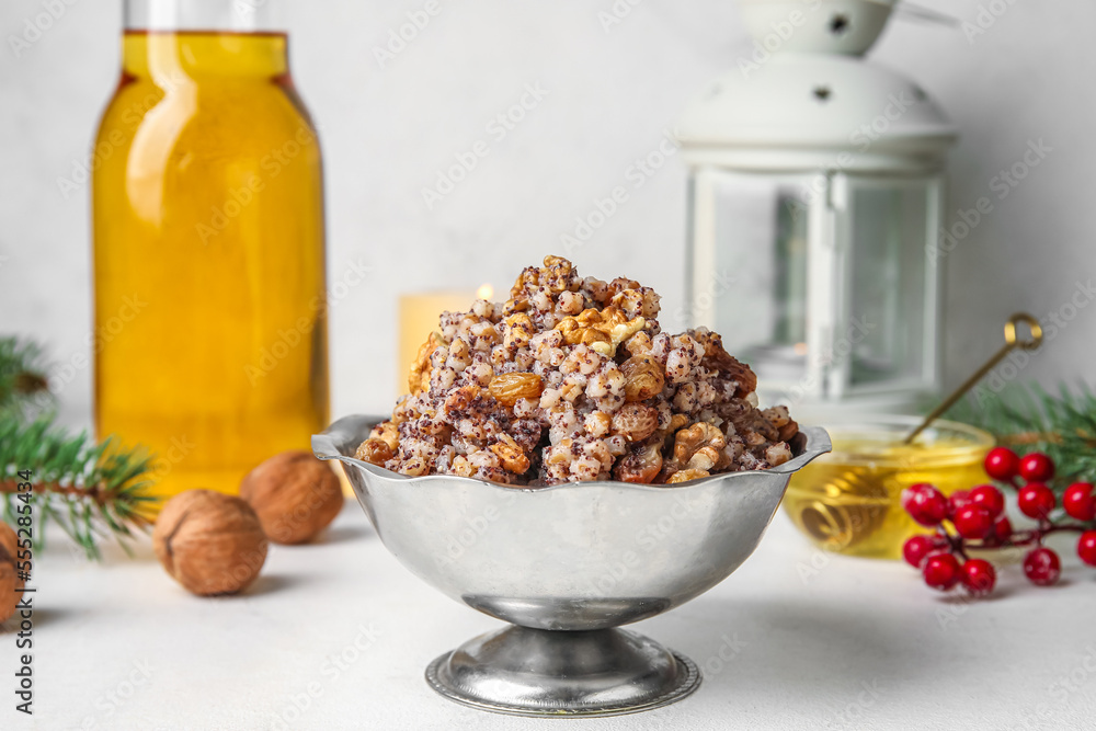 Bowl of Kutya on white table, closeup