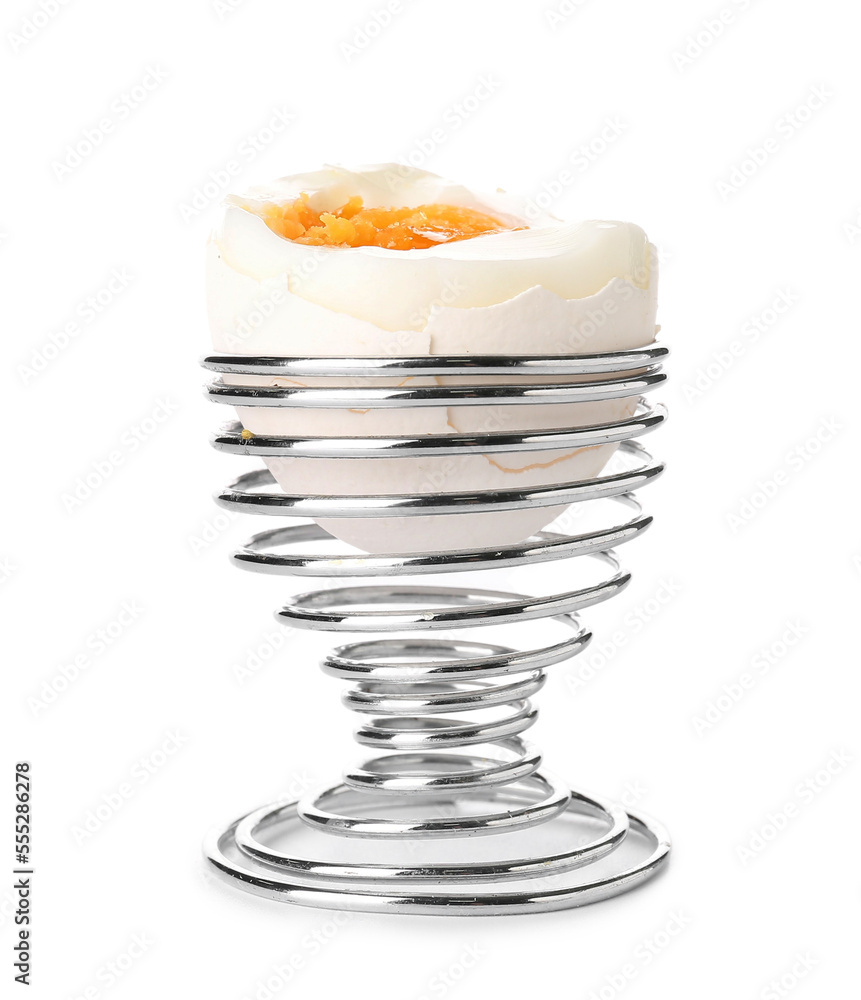 Soft boiled egg in holder on white background