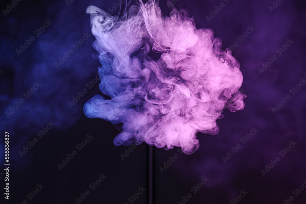 Violet smoke on black background