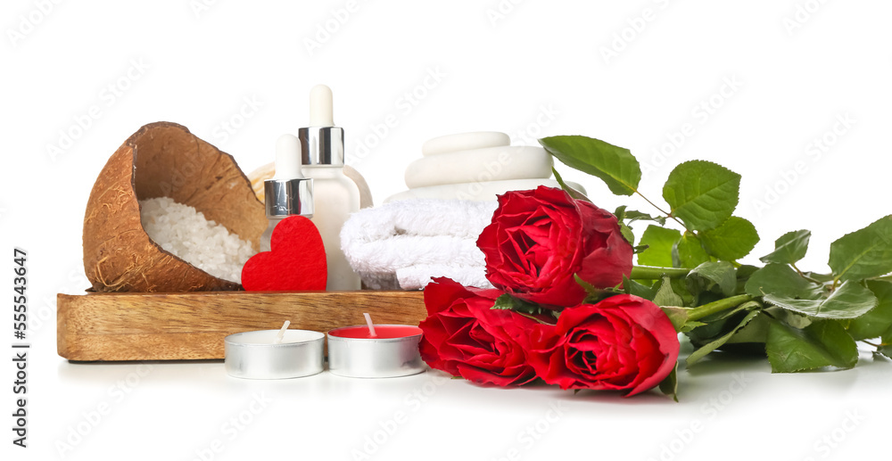 Spa composition for Valentines Day with stones and roses on white background