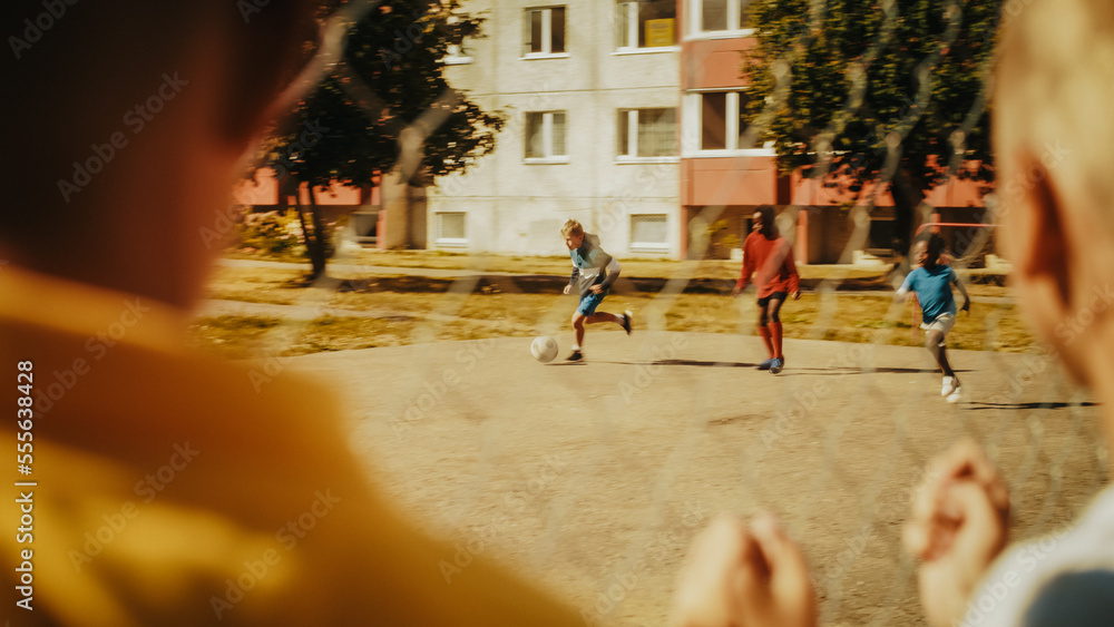 Neighborhood Friends Playing Soccer Outside in Urban Backyard. Multicultural Kids Play Football Toge