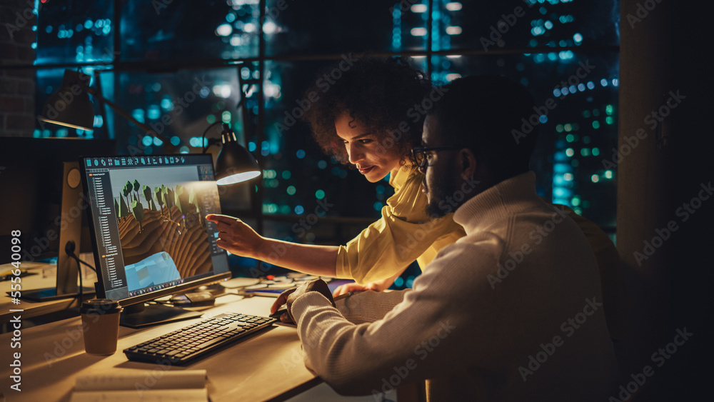 Two Stylish Employees Discussing Landscape Project on Computer in Architectural Agency in Loft Offic