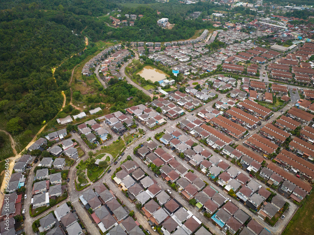 New development real estate. Aerial view of residential houses and driveways neighborhood during a f