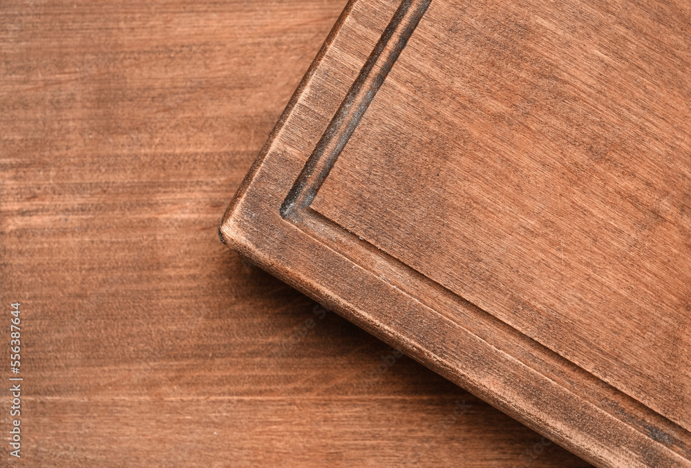 Closeup view of board on wooden background