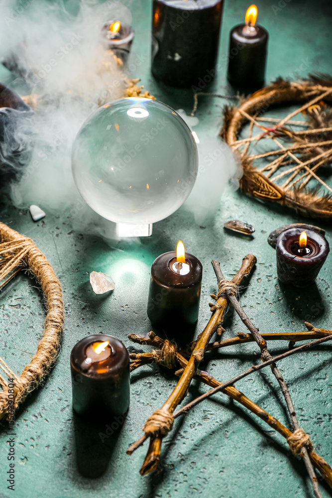 Magic attributes of fortune teller on green table