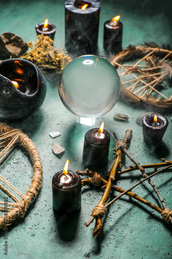 Magic attributes of fortune teller on green table