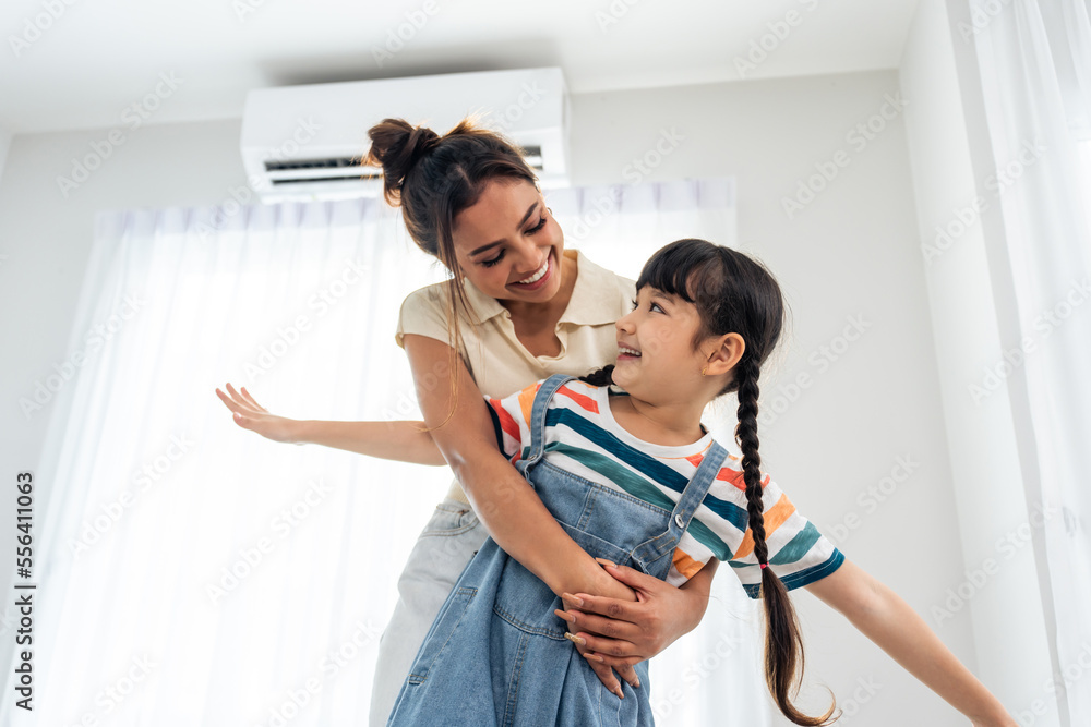 Caucasian happy family, parent spend free time with kid together at home.