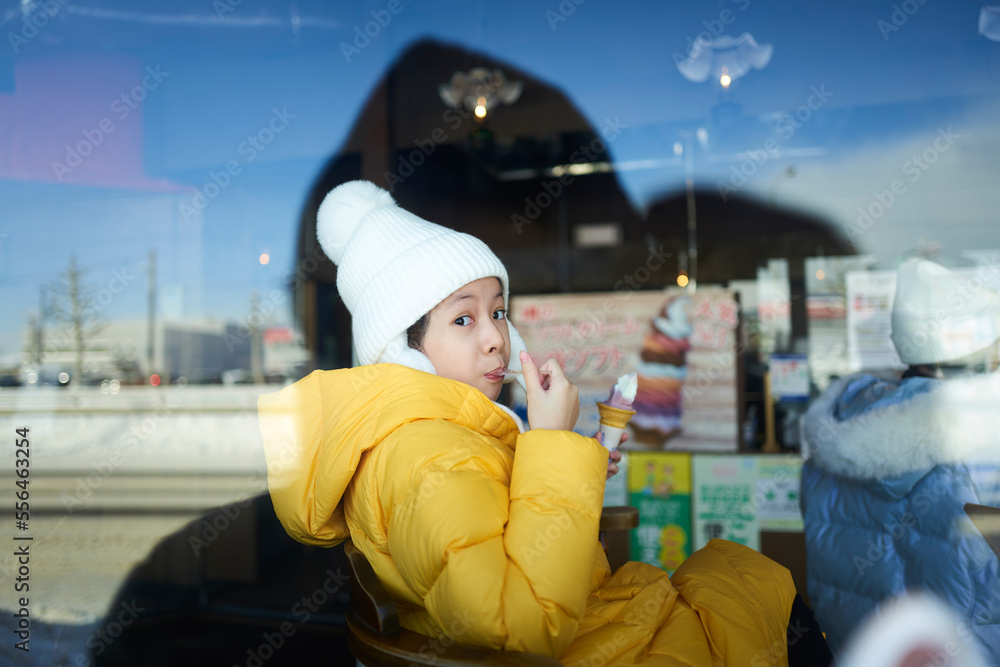 Little girl is enjoying Hokkaido famous ice cream