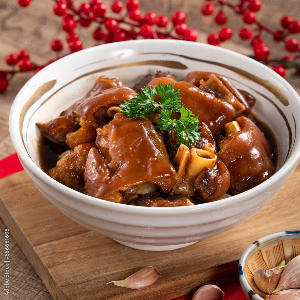 Taiwanese traditional food pork knuckle in a bowl for Chinese Lunar New Year meal.