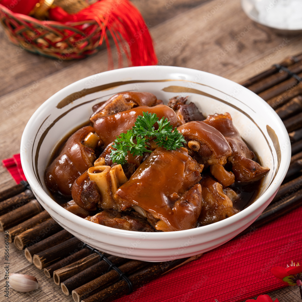 Taiwanese traditional food pork knuckle in a bowl for Chinese Lunar New Year meal.