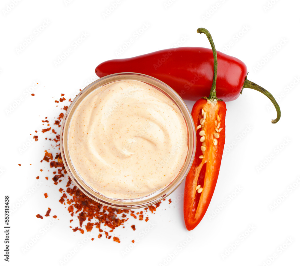 Bowl of tasty chipotle sauce and fresh jalapeno peppers on white background