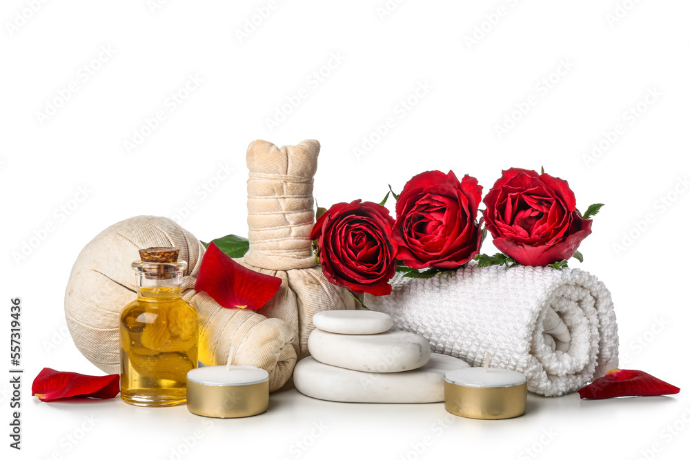 Spa composition for Valentines Day with stones, candles and roses on white background