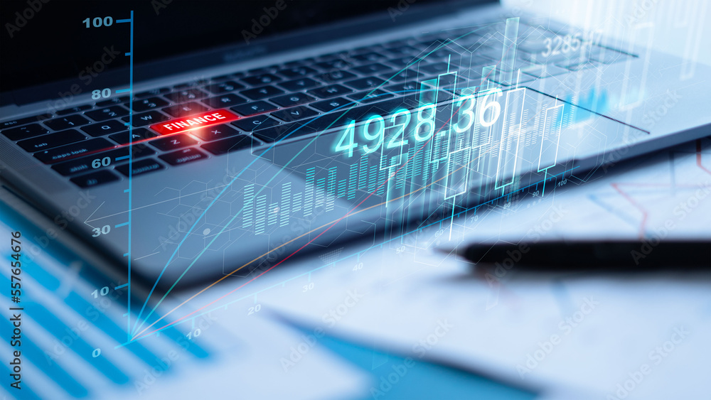 .Finance and  banking, Laptop with sales data and economic growth graph chart on virtual interface. 