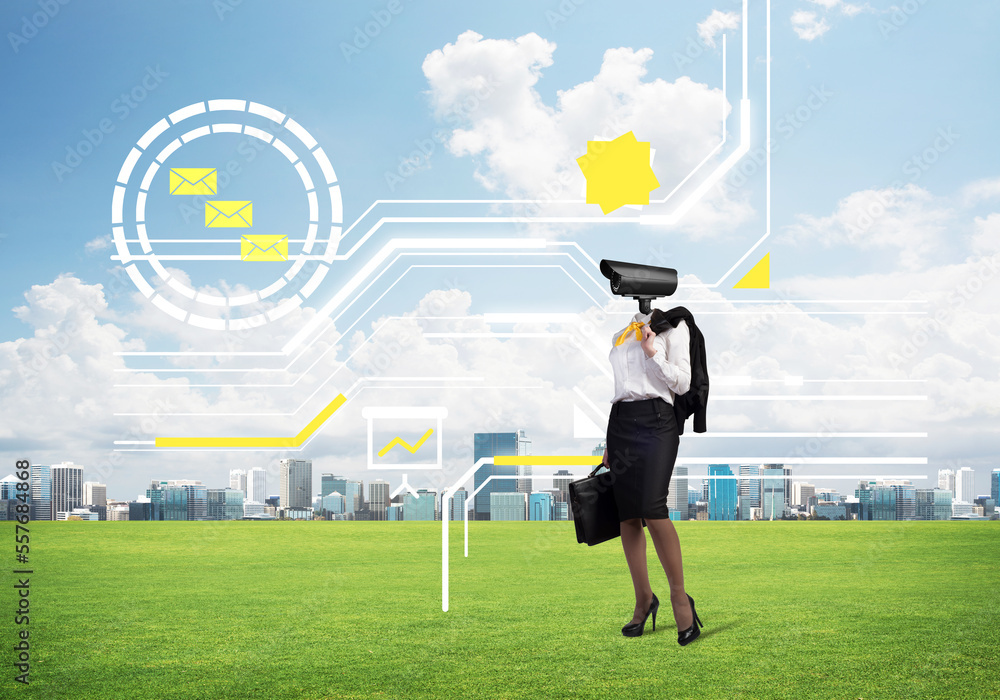 Camera headed woman standing on green grass against modern cityscape