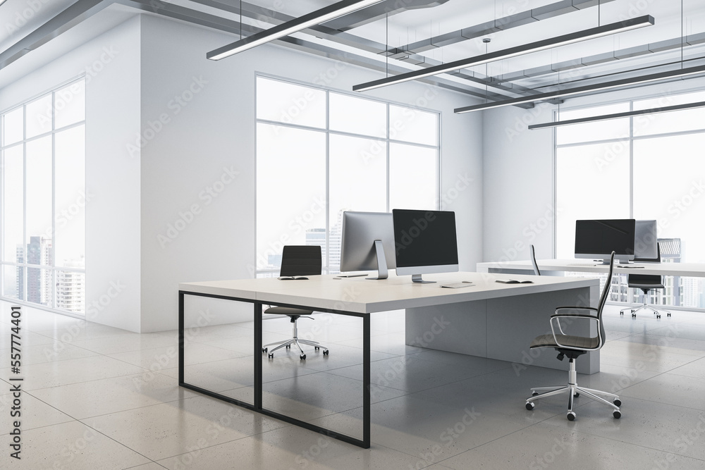 Perspective view on stylish workspace table with modern computers on glossy ceramic tiles floor in c