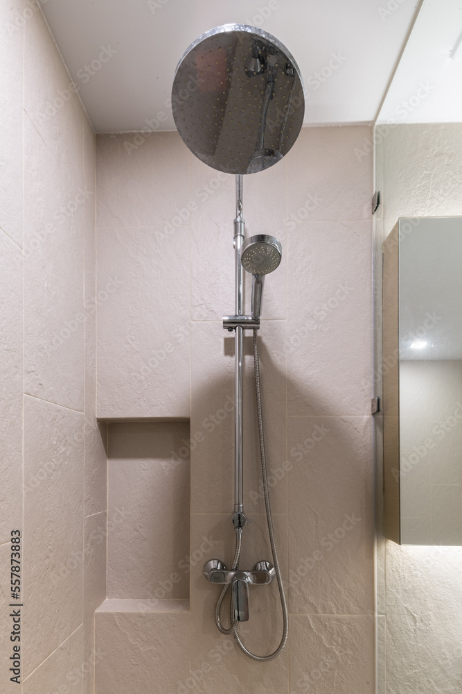 Loft white tile bathroom corner, tub and sink