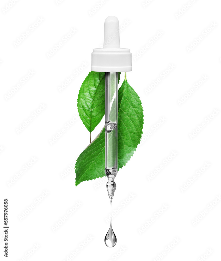 Cosmetic pipette with green leaves close-up isolated on a white background