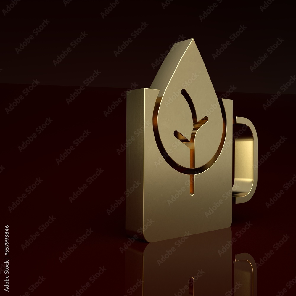 Gold Cup of tea with leaf icon isolated on brown background. Sweet natural food. Minimalism concept.