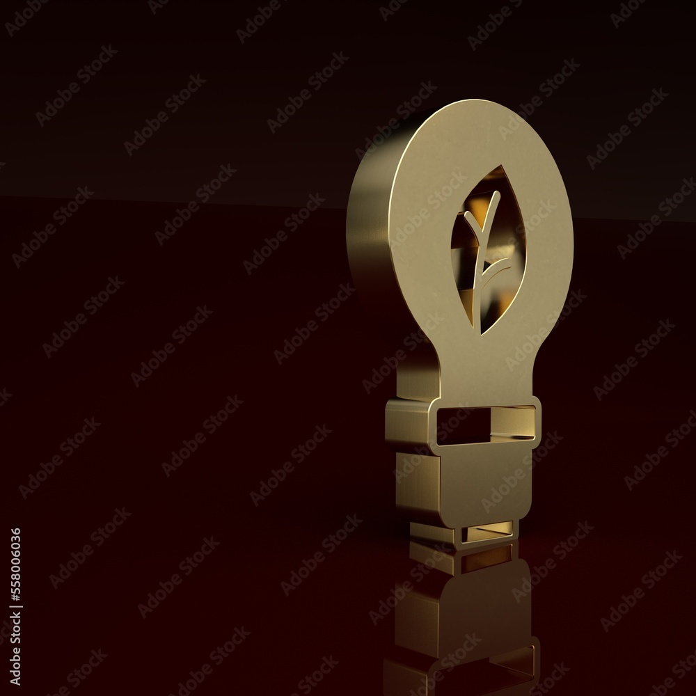 Gold Light bulb with leaf icon isolated on brown background. Eco energy concept. Alternative energy 