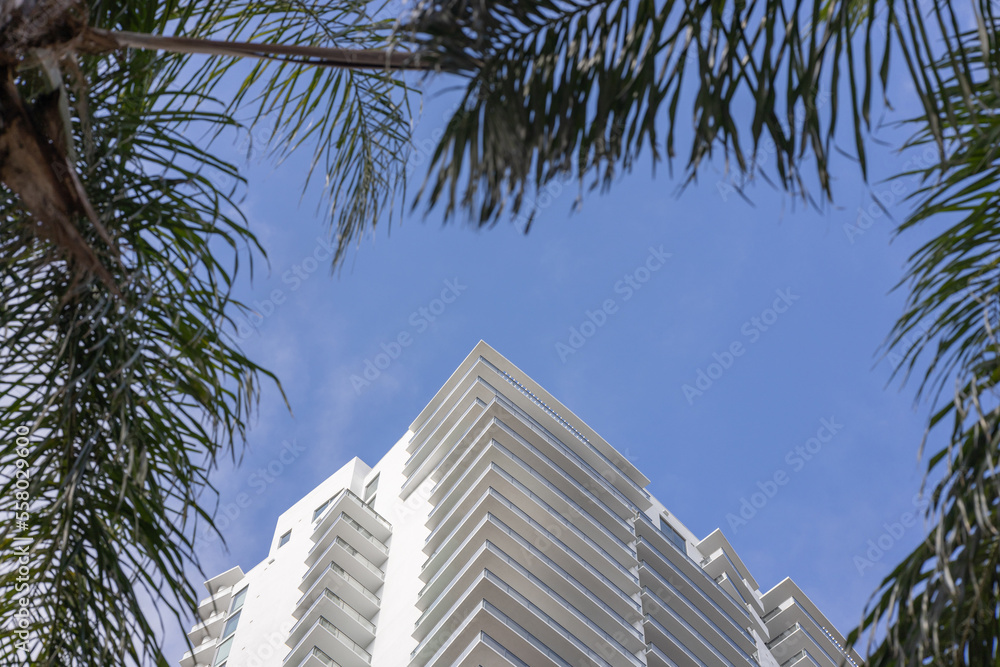 Looking up at a modern apartment building