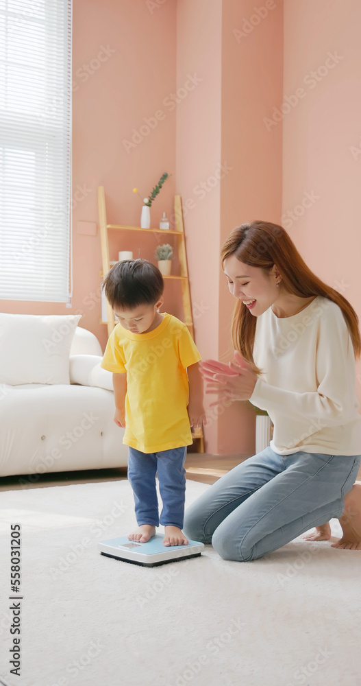 child standing on a scale