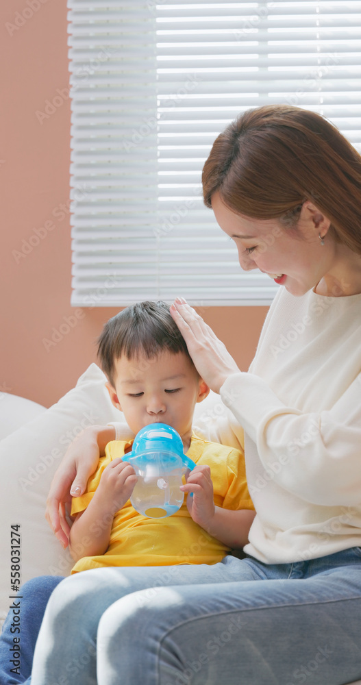 little boy drinking water